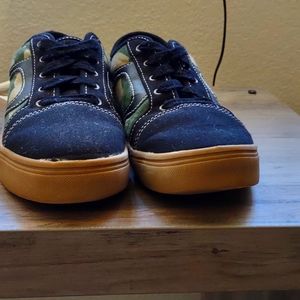Wonder nation shoes. There a size 9 and the color is Dark green camo and black